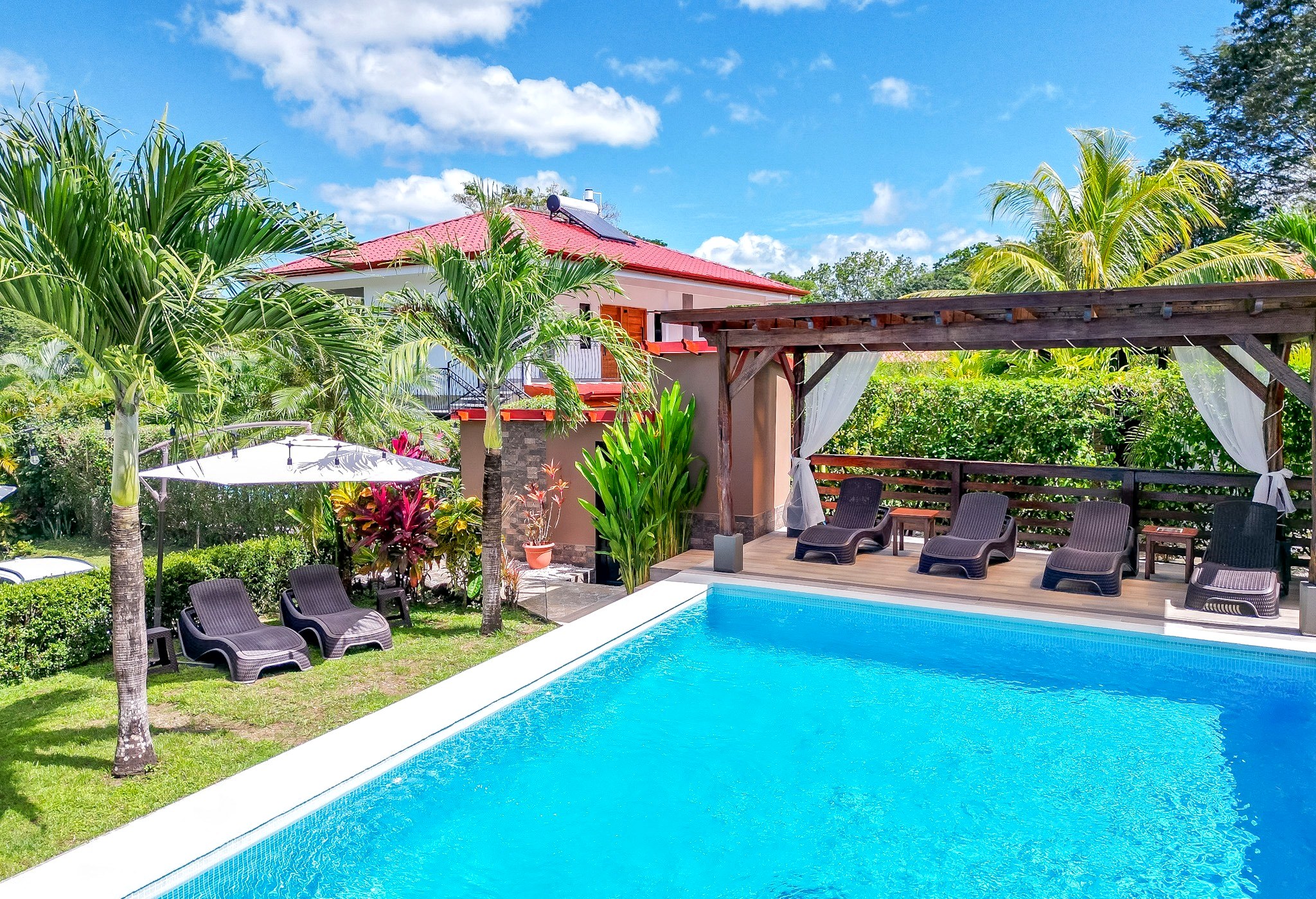 Pool and tropical gardens at Casa Buenavista